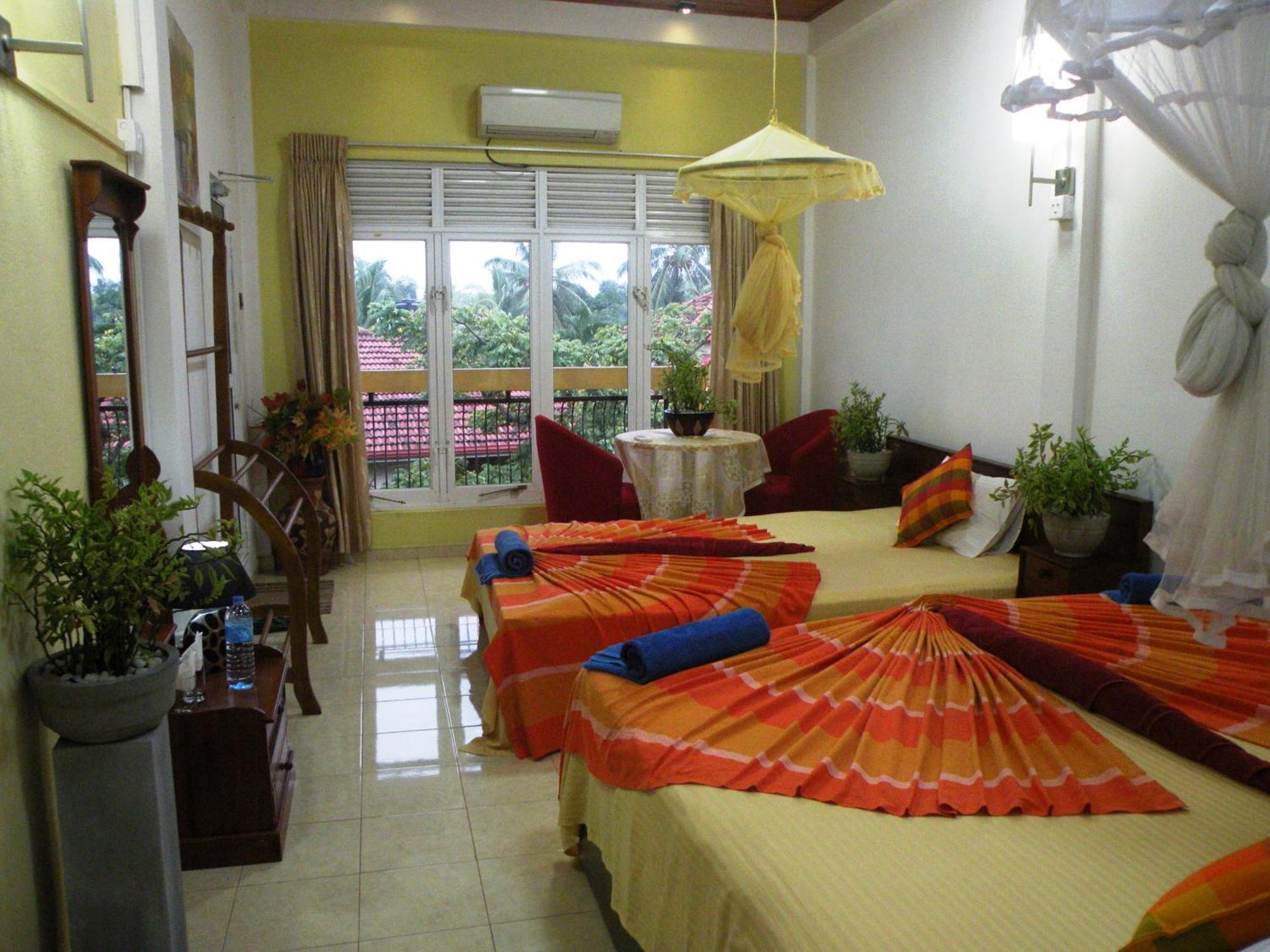 Henderson Airport Residence Negombo Phòng bức ảnh
